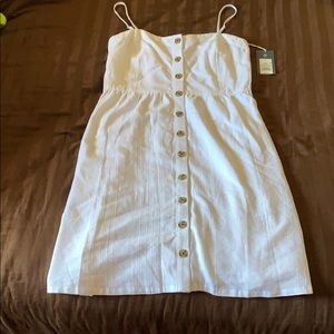 White spaghetti strap dress with pockets